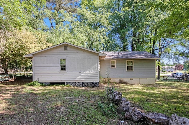 back of property with crawl space