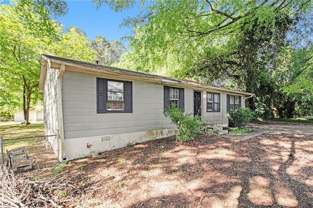 view of front of house with crawl space