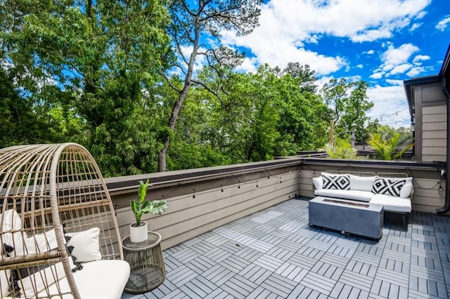 view of patio / terrace featuring outdoor lounge area and a balcony