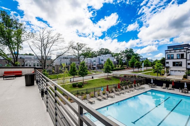 view of pool featuring a patio