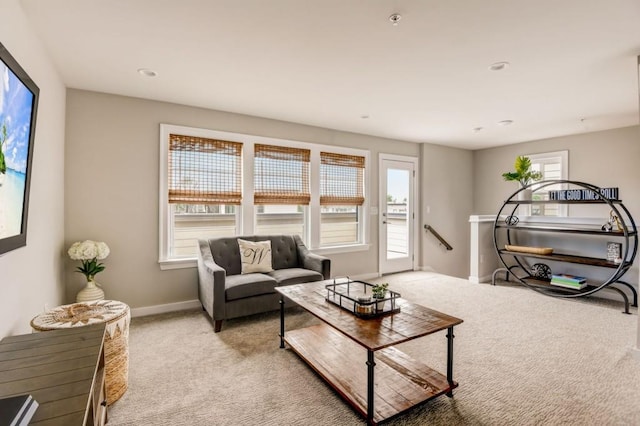 living room featuring light colored carpet