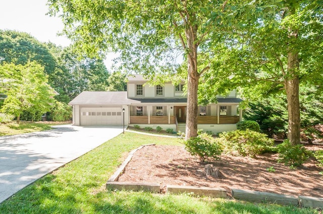 view of front of home with a garage and concrete driveway