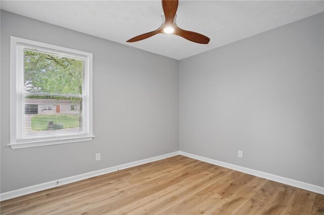 46 Forkwood Cir, Hiram, GA 30141 - empty room with baseboards, a ceiling fan, and light wood-style flooring