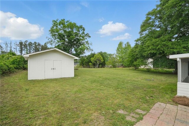 46 Forkwood Cir, Hiram, GA 30141 - view of yard with an outbuilding and a storage unit