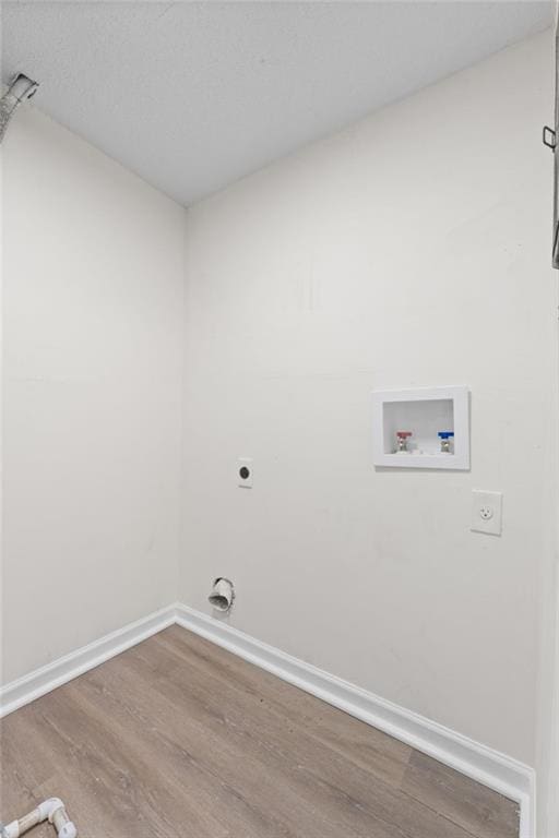 4701 Flat Shoals Rd Unit 56E, Union City, GA 30291 - clothes washing area featuring electric dryer hookup, hookup for a washing machine, and hardwood / wood-style floors