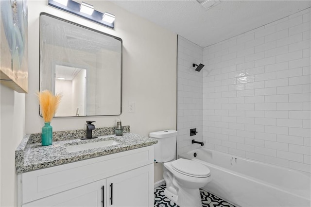 4701 Flat Shoals Rd Unit 56E, Union City, GA 30291 - full bathroom with vanity, a textured ceiling, tiled shower / bath combo, and toilet
