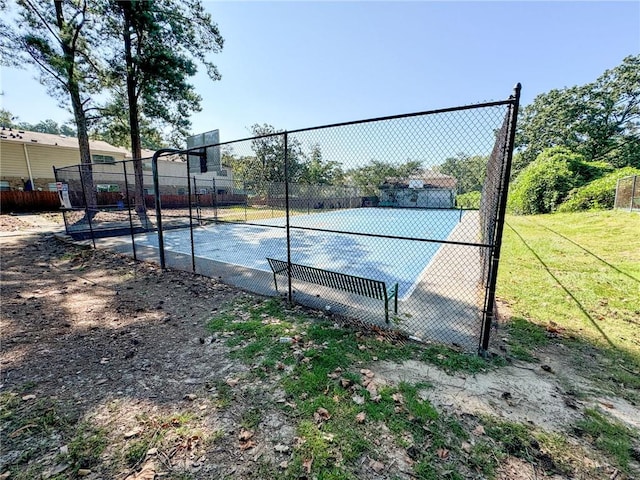4701 Flat Shoals Rd Unit 56E, Union City, GA 30291 - view of sport court with basketball hoop and a lawn