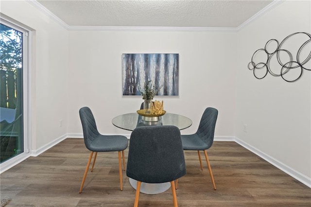4701 Flat Shoals Rd Unit 56E, Union City, GA 30291 - dining room with crown molding and dark wood-type flooring