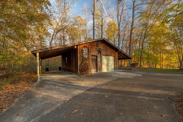 view of outbuilding featuring a garage
