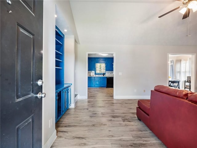 443 Rhett Dr, Loganville, GA 30052 - foyer with a ceiling fan and light wood finished floors