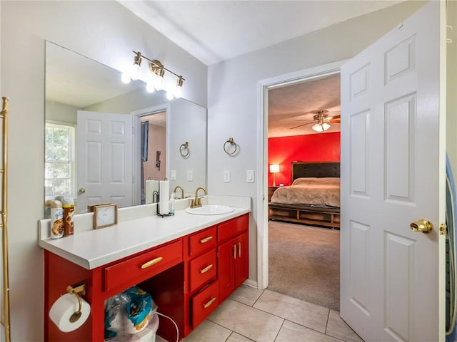 443 Rhett Dr, Loganville, GA 30052 - ensuite bathroom featuring vanity, tile patterned floors, and ceiling fan