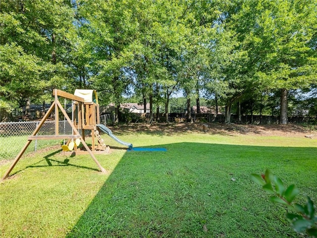 443 Rhett Dr, Loganville, GA 30052 - fenced backyard with a playground