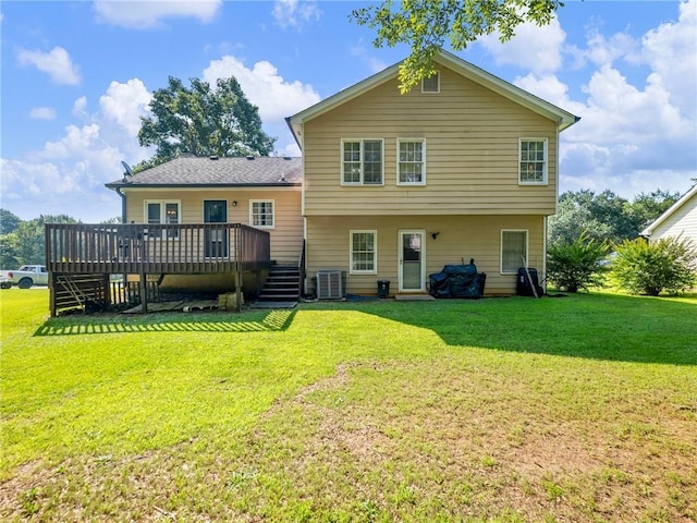443 Rhett Dr, Loganville, GA 30052 - rear view of house featuring a wooden deck and a lawn