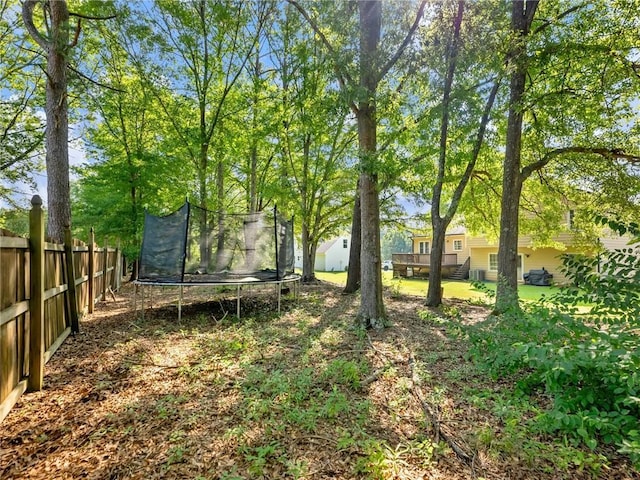 443 Rhett Dr, Loganville, GA 30052 - view of yard with a trampoline
