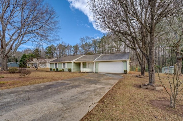 single story home featuring a front yard and a garage