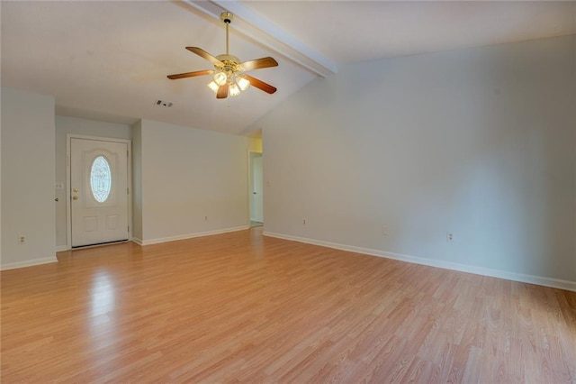 unfurnished living room with lofted ceiling with beams, light hardwood / wood-style flooring, and ceiling fan