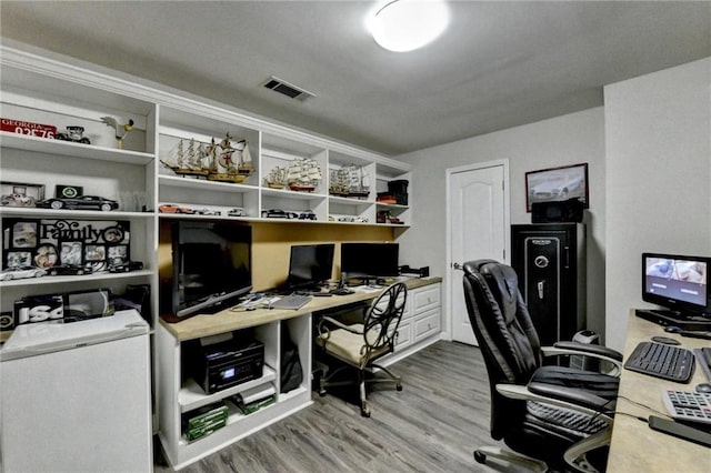 office featuring light hardwood / wood-style flooring