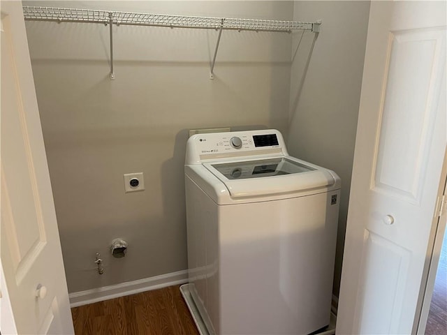 washroom featuring washer / clothes dryer and dark hardwood / wood-style flooring