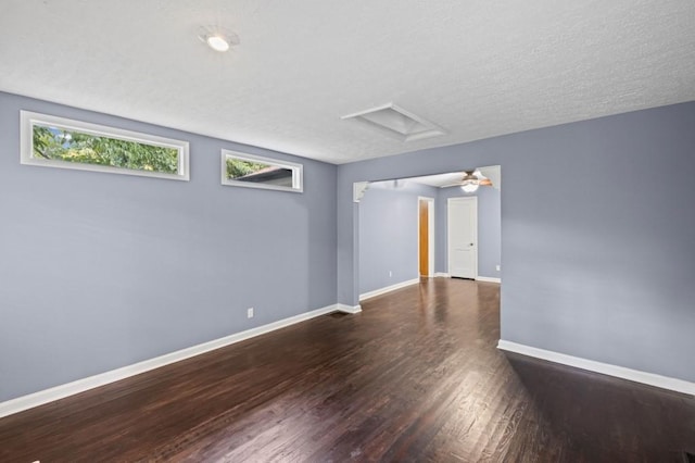 881 Mclinden Ave SE, Smyrna, GA 30080 - unfurnished room featuring attic access and wood finished floors