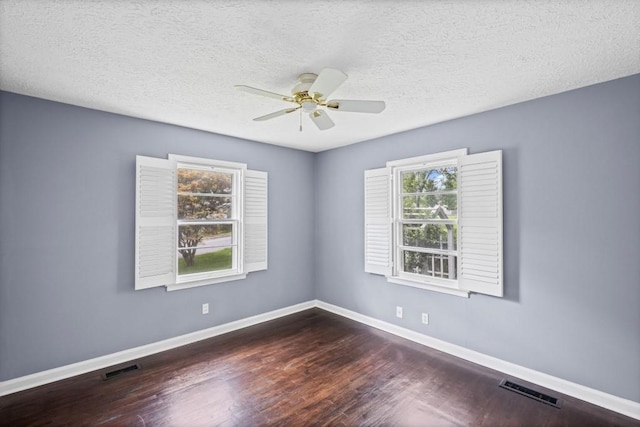 881 Mclinden Ave SE, Smyrna, GA 30080 - unfurnished room featuring wood finished floors, a ceiling fan, and a textured ceiling
