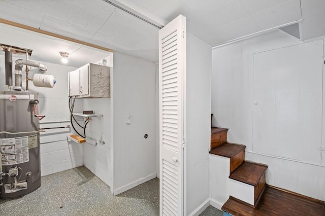 881 Mclinden Ave SE, Smyrna, GA 30080 - basement featuring gas water heater and stairs