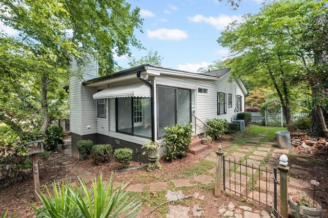 881 Mclinden Ave SE, Smyrna, GA 30080 - back of house featuring a chimney