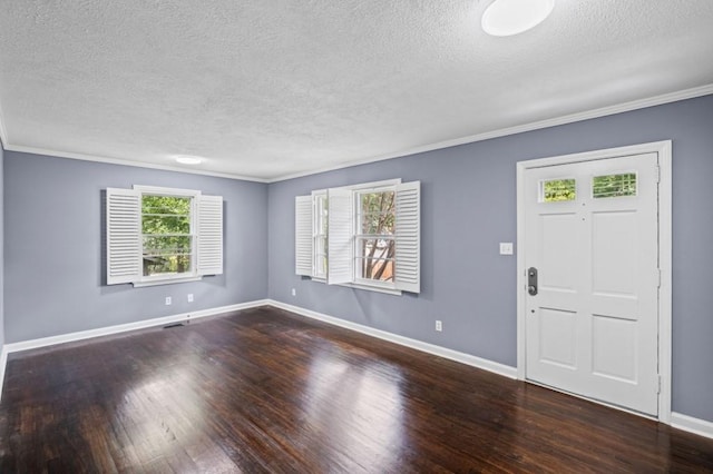 881 Mclinden Ave SE, Smyrna, GA 30080 - foyer with a textured ceiling, wood finished floors, and crown molding