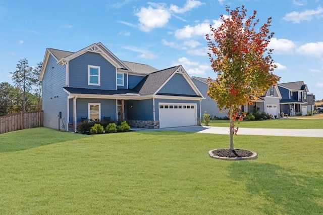 craftsman-style house with a front yard