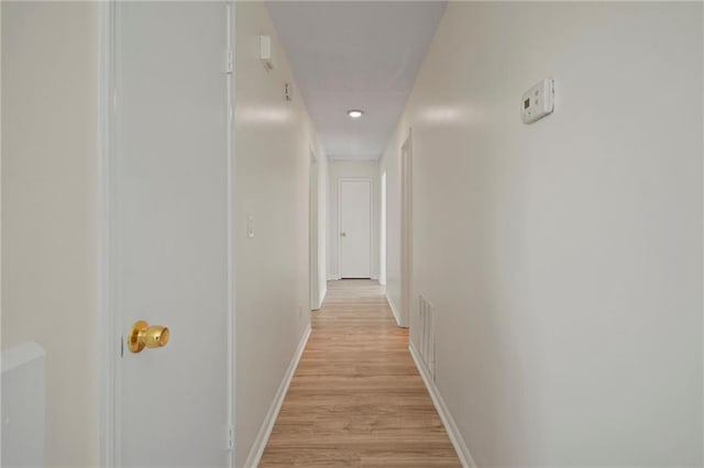 hall featuring light wood-type flooring