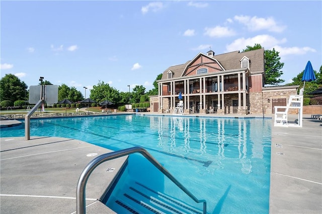 pool with a patio area