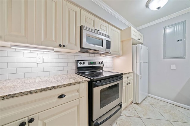 kitchen with tasteful backsplash, appliances with stainless steel finishes, ornamental molding, light stone countertops, and light tile patterned flooring