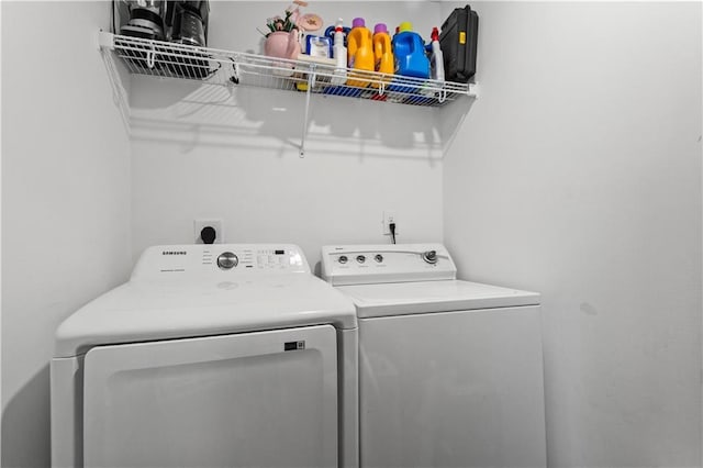 laundry room featuring laundry area and washer and clothes dryer