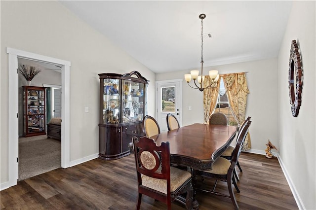 dining space with vaulted ceiling, baseboards, a chandelier, and dark wood-style floors