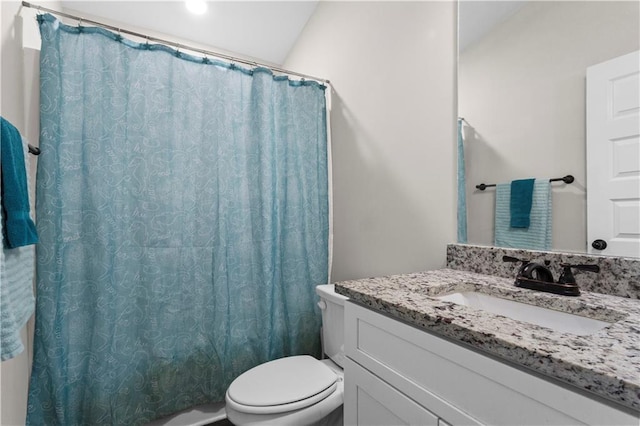 full bathroom with vanity and toilet