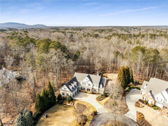 drone / aerial view with a forest view