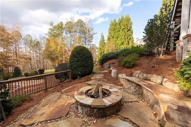 view of patio featuring a fire pit