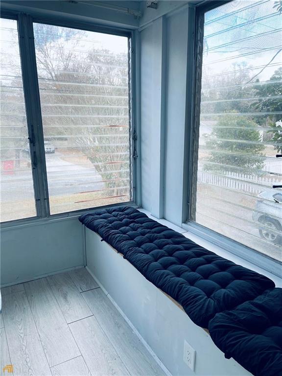 bedroom with light hardwood / wood-style floors