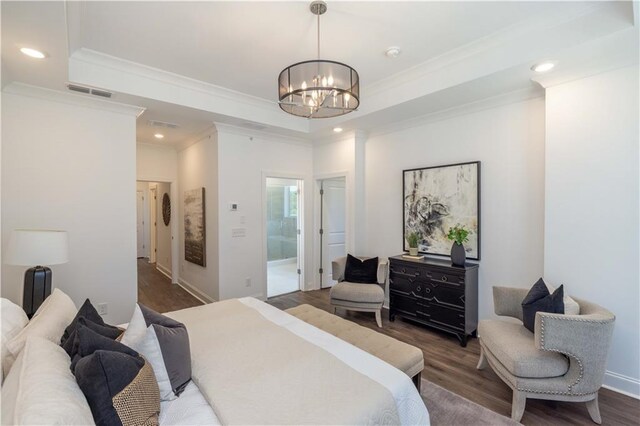 bedroom with ornamental molding, wood finished floors, a chandelier, recessed lighting, and ensuite bath