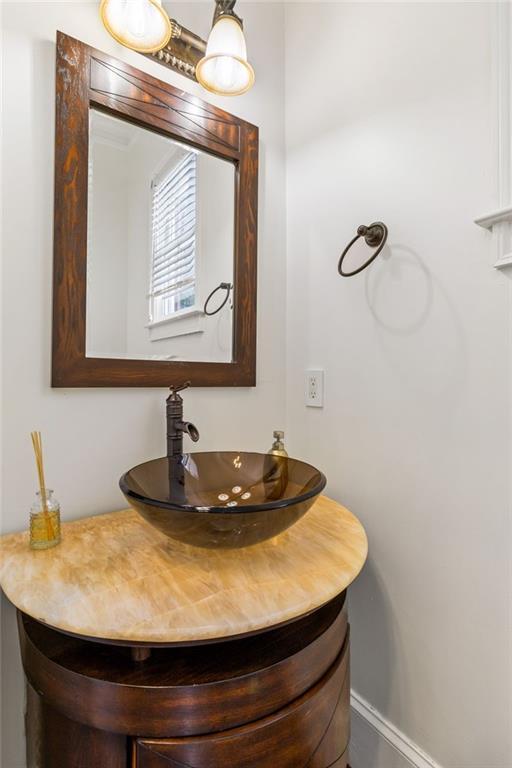 2616 Boddie Pl, Duluth, GA 30097 - sunroom / solarium featuring beamed ceiling and a notable chandelier