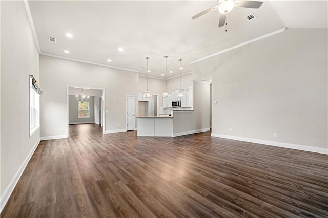 8230 Dawson View Way, Cumming, GA 30028 - unfurnished living room with baseboards, ornamental molding, and ceiling fan with notable chandelier
