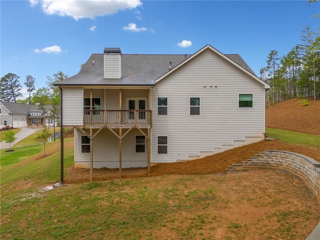 8230 Dawson View Way, Cumming, GA 30028 - back of property with a lawn, roof with shingles, and a chimney