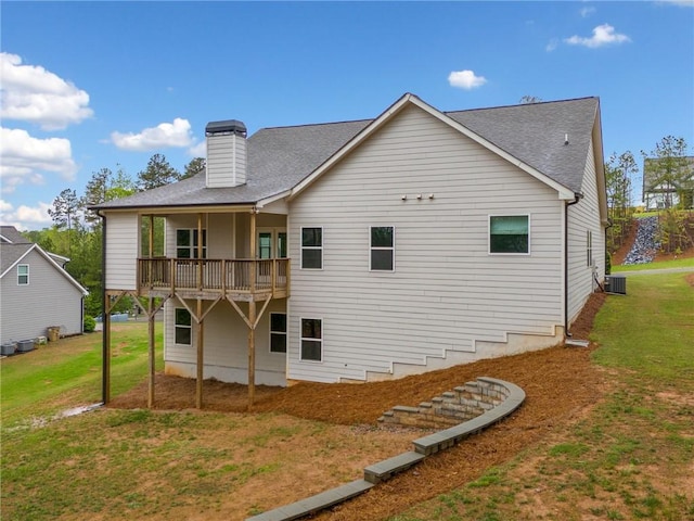 8230 Dawson View Way, Cumming, GA 30028 - back of house featuring a shingled roof, a chimney, a yard, and central AC