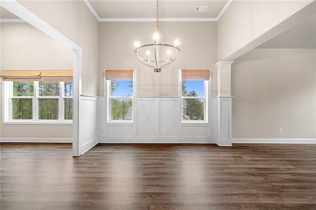 8230 Dawson View Way, Cumming, GA 30028 - unfurnished dining area with visible vents, wainscoting, a chandelier, ornamental molding, and dark wood-type flooring