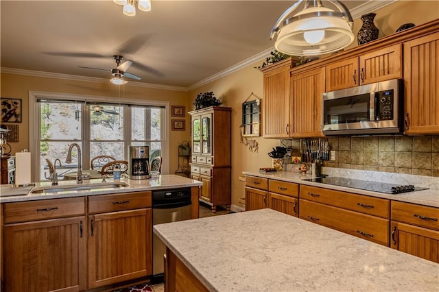 kitchen featuring backsplash, black electric cooktop, light stone counters, and sink