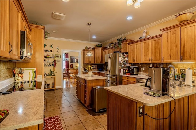 kitchen featuring a center island, stainless steel appliances, light stone counters, light tile patterned floors, and crown molding