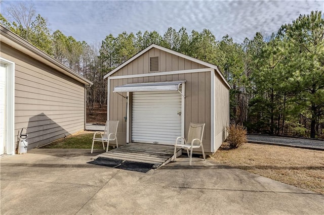 view of outbuilding with a garage