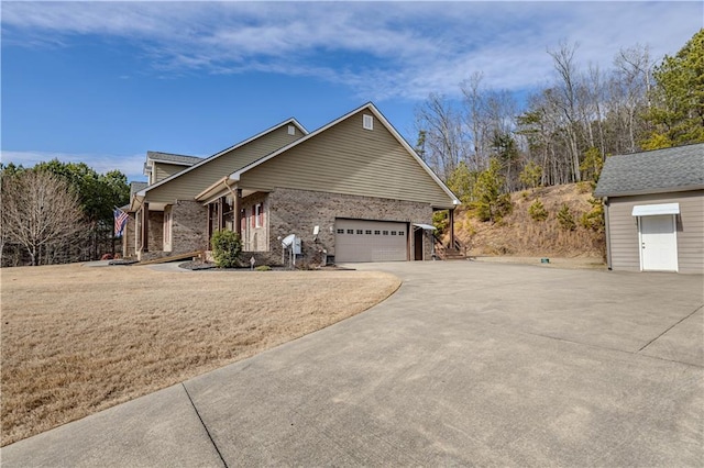 view of property exterior featuring a garage and a yard