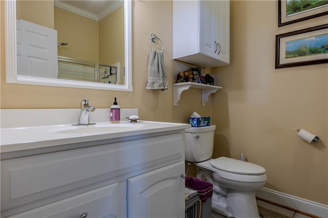 bathroom with a shower with shower door, toilet, vanity, and ornamental molding