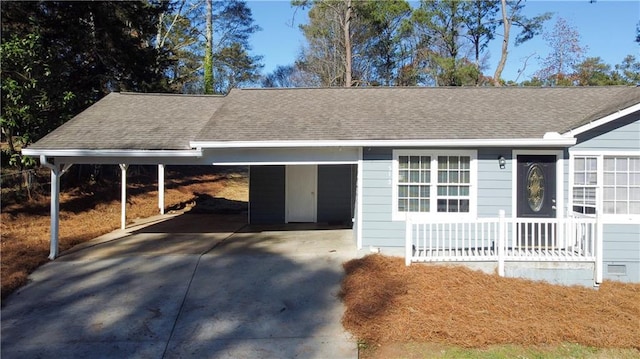 single story home featuring a carport