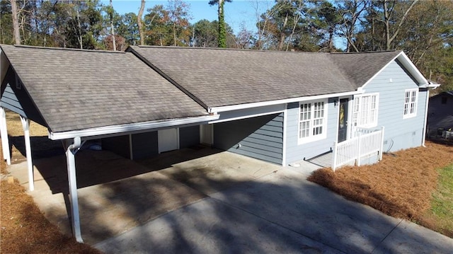 view of front of home with a carport